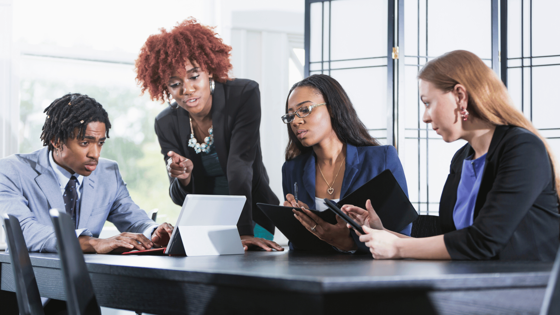 OnePoint team helping clients